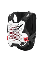 Alpinestars Tech-Air® MX System, gilet airbag tout-terrain autonome, blanc et noir, plaque de poitrine blanche perforée avec logo noir, boucles latérales rouges, châssis en maille extensible noire, protection avancée pour le motocross et le supercross